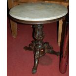 A Victorian mahogany and white variegated marble topped circular pedestal occasional table
