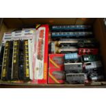 A box of Hornby railway 00 gauge trains, carriages and rolling stock,
