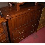 A contemporary stained pine hinged top side cupboard, having twin long lower drawers, w.