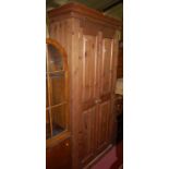 A modern pine double door wardrobe, w.