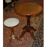 A contemporary hardwood pedestal occasional table;