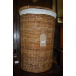 A wicker demi-lune hinged top laundry box, h.