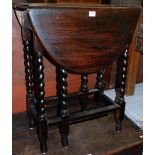 A small early 20th century oak barleytwist gateleg occasional table