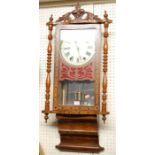 A late Victorian walnut and inlaid droptrunk wall clock