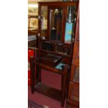 An Edwardian walnut mirrorback hall-stand, w.