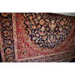 A Keshan woollen rug 190 x 140cm