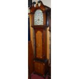 An early 19th century oak, mahogany and satinwood inlaid longcase clock, having painted arch dial,