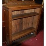 A circa 1900 line carved oak ledgeback freestanding open bookshelf, w.