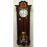 An early 20th century walnut droptrunk wall clock, having glazed trunk door, with twin weights,