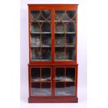 *A 19th century mahogany, satinwood inlaid and rosewood crossbanded bookcase cabinet,