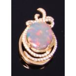 An 18ct gold, black opal and diamond set pendant,