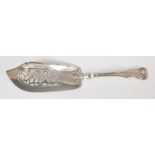 An early Victorian silver cake slice, having pierced floral blade and Kings Pattern handle,