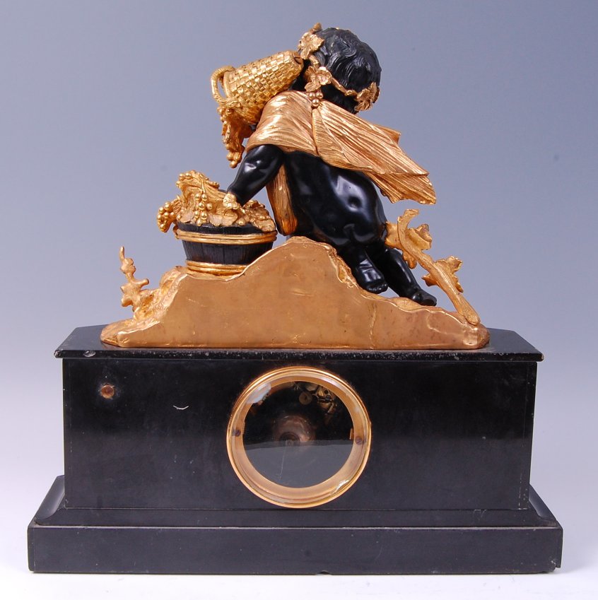 A late 19th century French gilt and patinated bronze black slate mantel clock, - Image 4 of 6