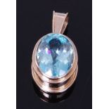 An 18ct white gold and aquamarine pendant, the large oval cut aquamarine measuring approx 1.