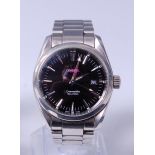 A gents steel cased Omega Seamaster wristwatch, having signed black dial, baton markers,