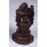 An early 20th century Chinese cast bronze figure of a standing Buddha,