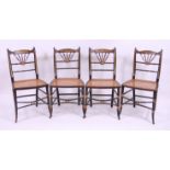*A set of four Regency ebonised simulated bamboo and gilt decorated bedroom chairs,
