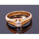 An 18ct gold gents diamond solitaire ring, the claw set old cut diamond weighing approx 0.