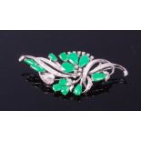 An 18ct white gold, jade and diamond set leaf and flower brooch,