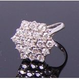 An 18ct white gold and diamond flower head cluster ring,