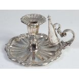 A George VI silver chamberstick, of shaped form, with floral detail,