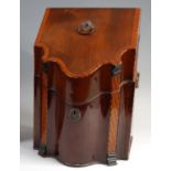 A George III mahogany and inlaid knife-box, the shaped front with satinwood,