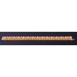 An 18ct gold fancylink bracelet,