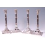 A set of four Victorian Old Sheffield Plate table candlesticks,