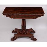 A William IV rosewood tea table, the D-shaped fold-over top within gadrooned edge,