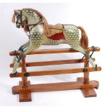 An circa 1900 dapple-grey rocking horse, probably by Ayres,