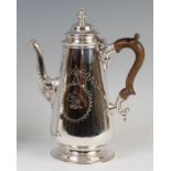 A Victorian silver coffee pot in the early 18th century style,