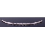 An 18ct white gold and diamond set tennis bracelet,