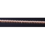 An 14ct gold and diamond set choker, arranged as 172 claw set brilliants in tramline type setting,