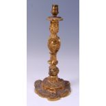 A late 19th century French Rococo Revival gilt bronze table lamp,
