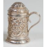 A late Victorian silver pepperette, in the form of a tankard,