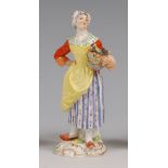 A Meissen porcelain figure 'The Female Grape Seller',