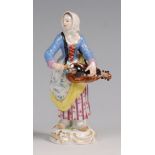 A Meissen porcelain figure 'The Hurdy-Gurdy Player',