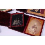 *A Victorian daguerreotype three-quarter portrait of a young girl, in fitted leather case,