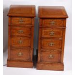 A pair of oak and crossbanded bedside chests,