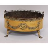 A Regency brass coal-bin, having pierced gallery and twin handles,