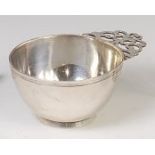 A Victorian Scottish silver christening bowl, of circular form, having floral pierced handle,