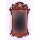 *A 19th century mahogany wall mirror, in the Chippendale style,