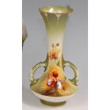 A Royal Worcester porcelain footed vase,