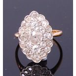 An Art Deco 18ct gold and diamond table ring,