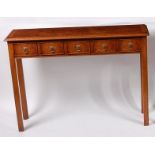 A Georgian style burr elm and mahogany crossbanded five drawer hall table,