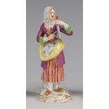 A Meissen porcelain figure 'Woman with Triangle',