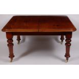 A Victorian mahogany extending dining table,