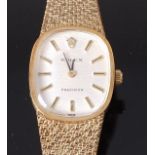 A ladies Rolex 14ct gold cased wristwatch, having signed silvered oval dial with baton markers,