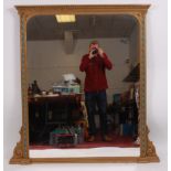 A Victorian giltwood and gesso overmantel mirror, having a moulded frieze,