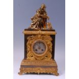 A mid-19th century French gilt bronze figural mantel clock,